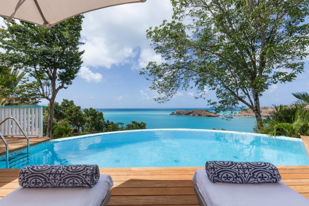 Pool and sea view from the Antigua villa. Thiings to do on Antigua. Caribbean islands