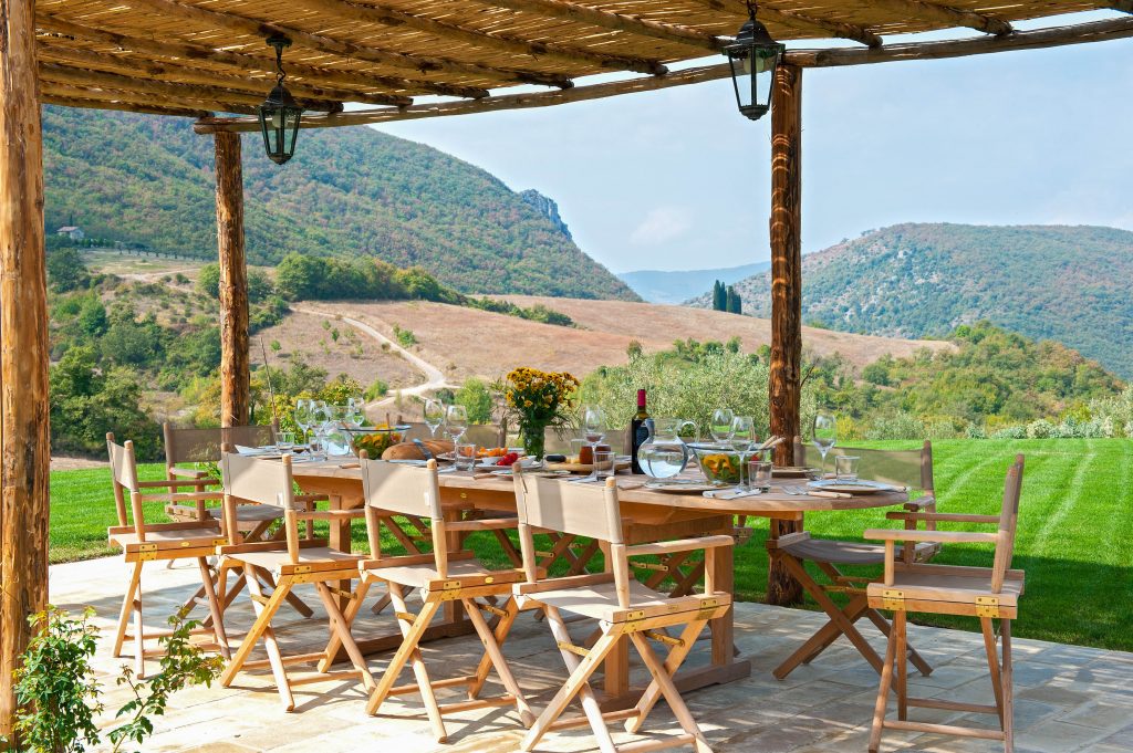 Alfresco dining area at villa Dulfa, Umbria. Easter in Italy