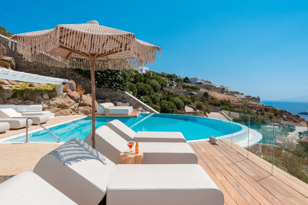 Villa Carmina with sea views, infinity pool, and access to vibrant attractions.