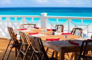 Tables at seaside restaurant with beautiful viewTables at seaside restaurant with beautiful view. Dining tips Turks and Caicos