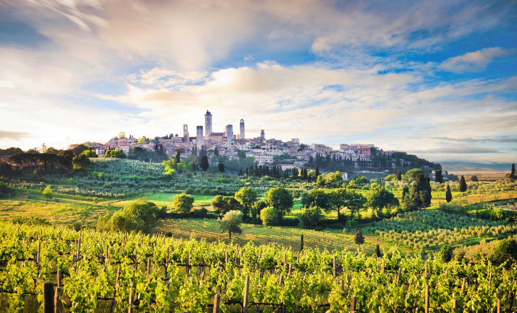 Beautiful landscape with the medieval city of San Gimignano at sunset. Explore Tuscany