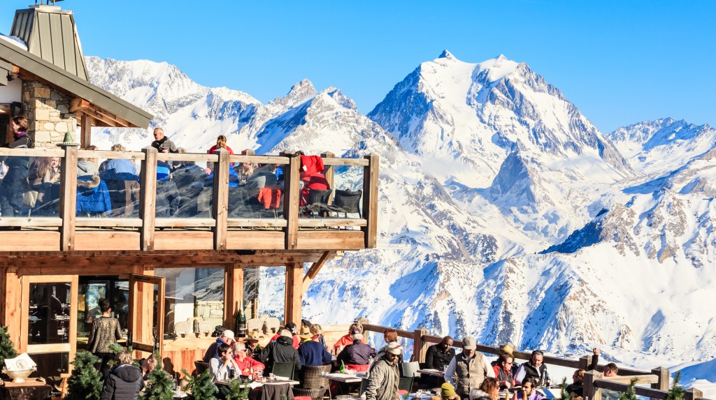 Restaurant in the mountains. Ski Resort Courchevel in wintertime. Best Restaurants Courchevel
