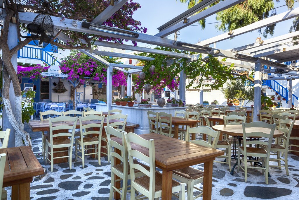 Greek taverna on island of Mykonos. Restaurants in Myconos.