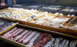 An outdoor stall of jewellery and shells. Turks and Caicos Souvenirs