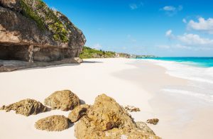 Crane Beach is one of the most beautiful beaches on the Caribbean island of Barbados. It is a tropical paradise with a white sand, turquoiuse sea and surrounding rocks. Beach Guide Barbados