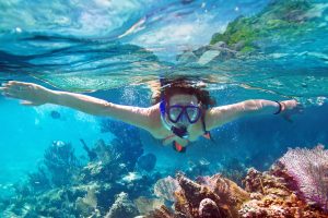 Snorkeling in the tropical water. Xel Ha Action Park in the Maya Riviera