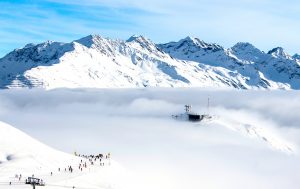 Ski lift on the top of the mountain in St Anton in Austria, above the clouds