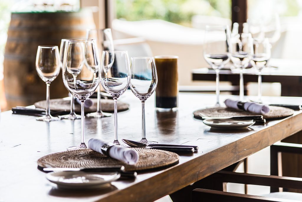 Selectiv soft focus on Wine glass on dining table in restaurant. Places to Eat on St Martin