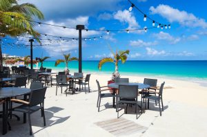 Restaurant at beach. Unforgettable dining experiences in Cayman Islands