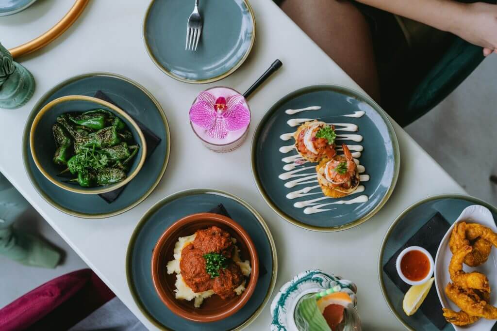 Tapas and dipping sauce at El Rincón de Paco, a rustic Cap Cana dining spot with authentic Spanish flavors