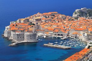 Aerial shot of old sunny Dubrovnik city. Spring Getaway to Croatia