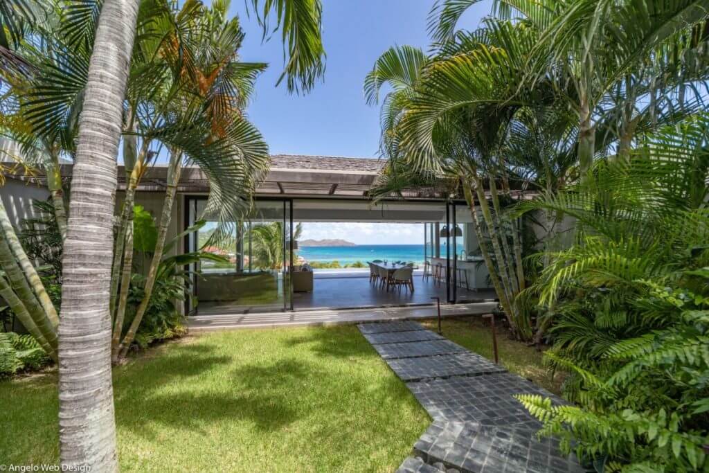 Villa Varuna in St Barts with ocean views, open-air dining, and modern tropical luxury living