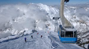 Spectacular view to the mountains and blue ski tram at Snowbird ski resort in Utah. Ski Park City
