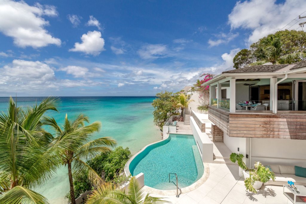 Portobello Villa vs. Hotels - a Private Luxury Vacation Rental with beach access, infinity pool, and ocean-view terrace.