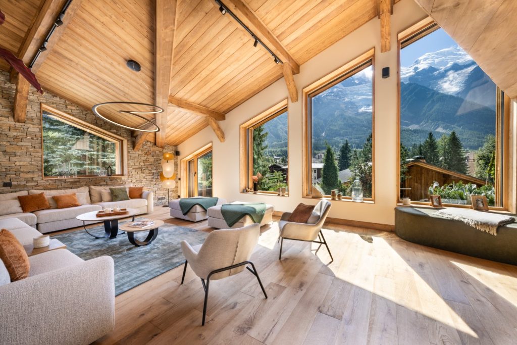 Chamonix Granite Mountain Lodge with large windows and mountain views, perfect for a luxury coolcation in the French Alps
