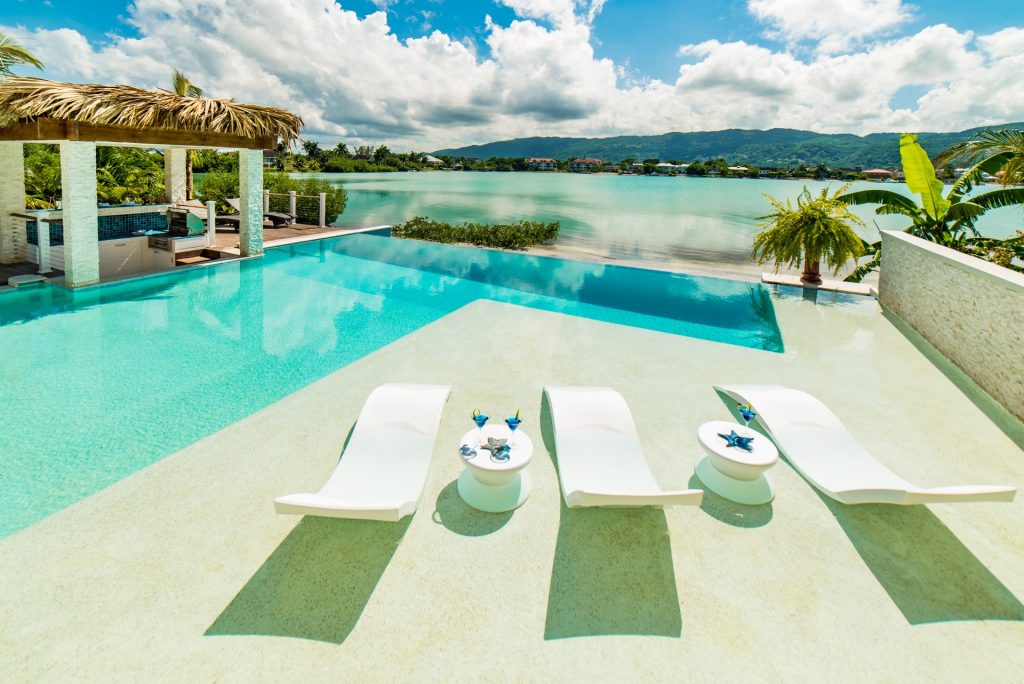 Infinity pool at Everything Nice by the Sea villa in Montego Bay, an elegant escape after enjoying the Mobay Jerk Festival.