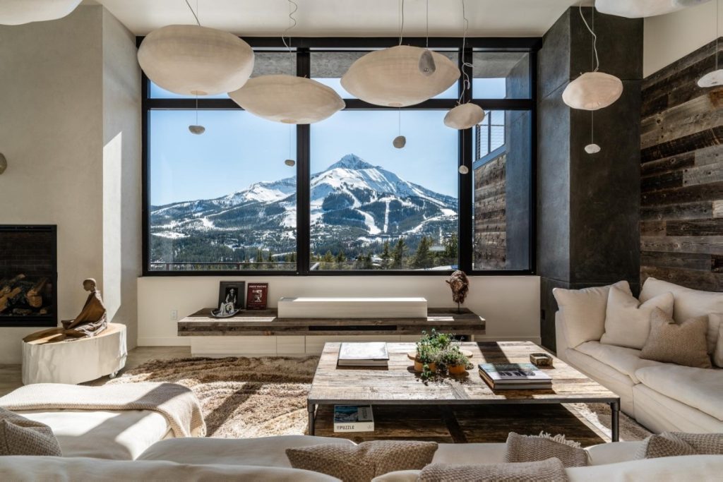 Big Sky villa The View with snowy mountain views and cozy interiors, ideal for a luxury coolcation in scenic Montana.