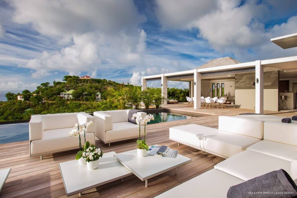 Villa Legends B offers panoramic views and refined outdoor living near the festive charm of Village de Noël in St Barts.