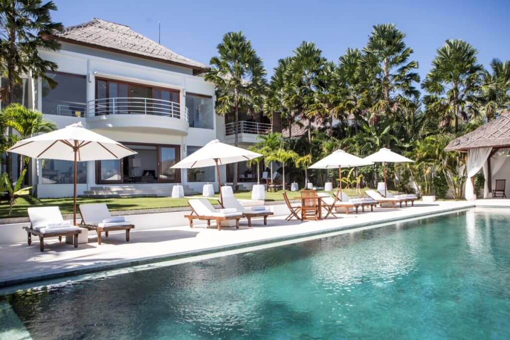 Villa Lucia with pool and palm-lined garden, part of the best of Bali holiday destinations for refined festive escapes