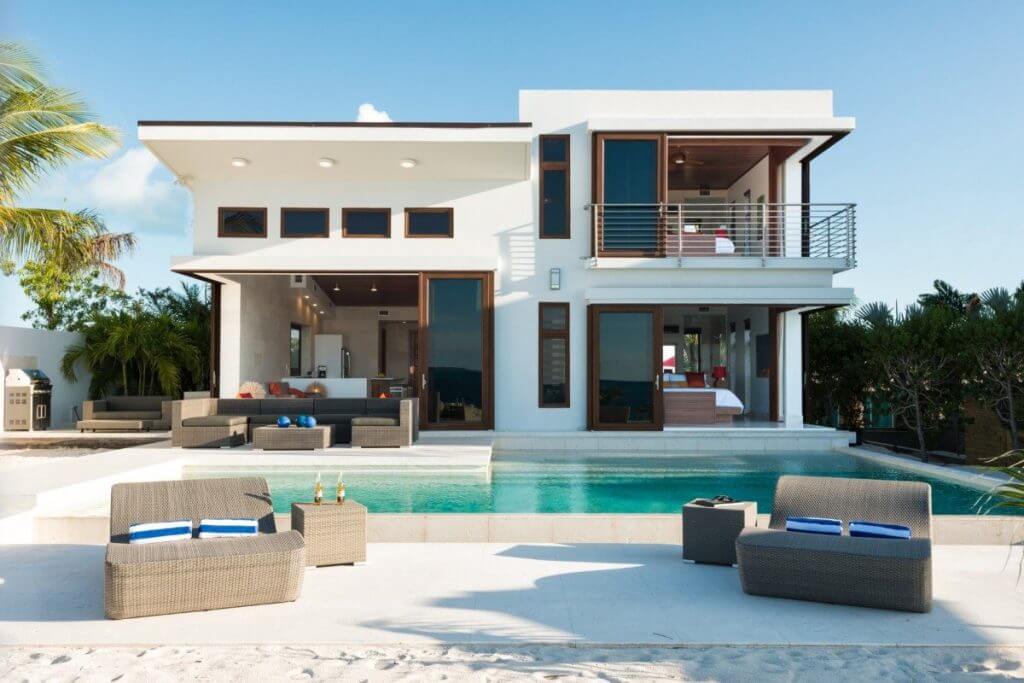 Top 10 TCI Villa Beach Kandi with beachfront pool and modern open-air design