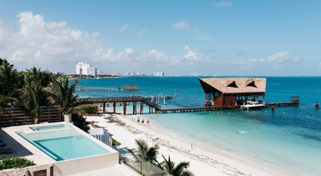 Casa Zul beachfront pool and pier in Mayan Riviera with luxury concierge services by Isle Blue