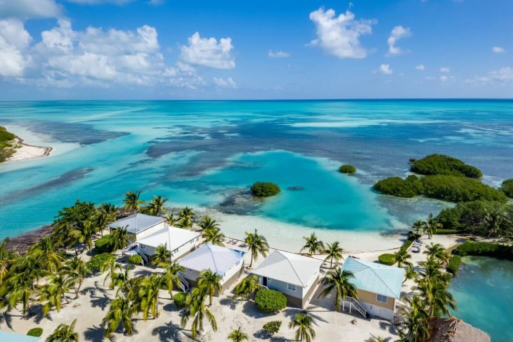 Shaka Caye Belize shows tailored experiences over standard luxury with beachfront villas and turquoise waters.