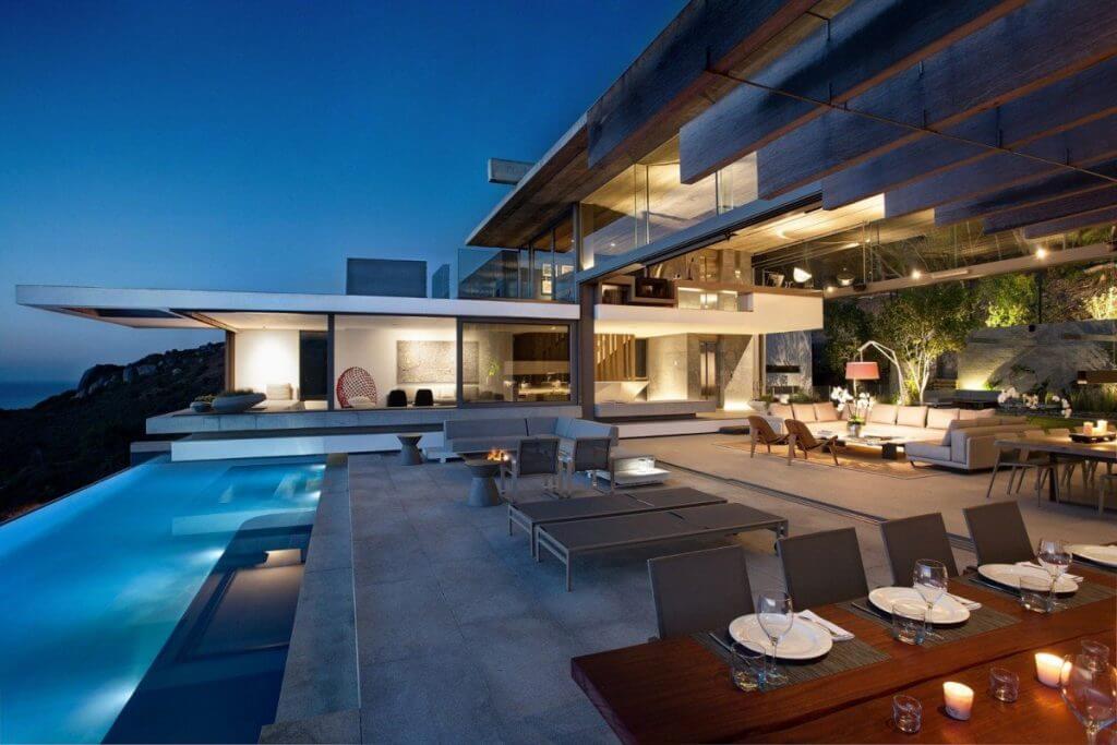Beyond villa in South Africa  with infinity pool, ocean views, and modern open-air design.