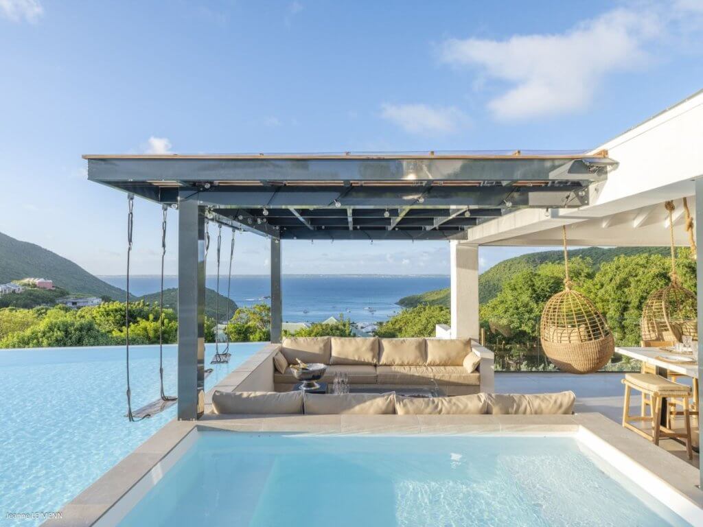 Villa Abaca infinity pool with ocean views and elegant lounge, one of the top 18 places to visit in January.