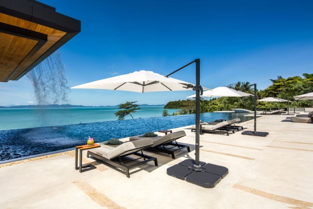 Amaravida villa in Phuket with infinity pool, sun loungers, and ocean views