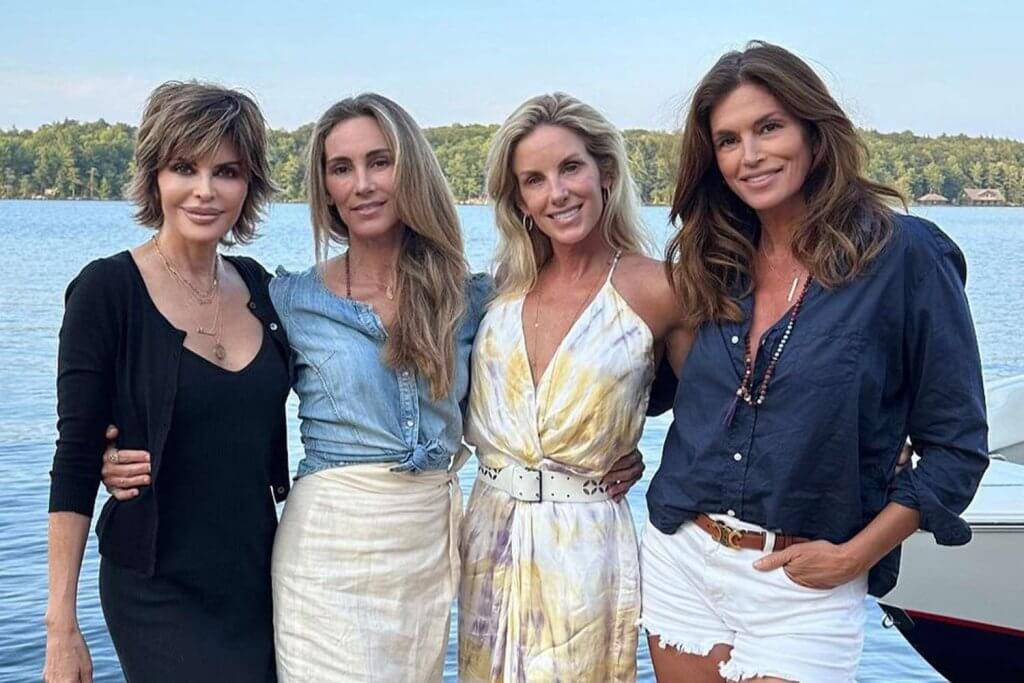 Cindy Crawford with friends by Muskoka Luxury Villa Rental lakefront, private dock and forest views.