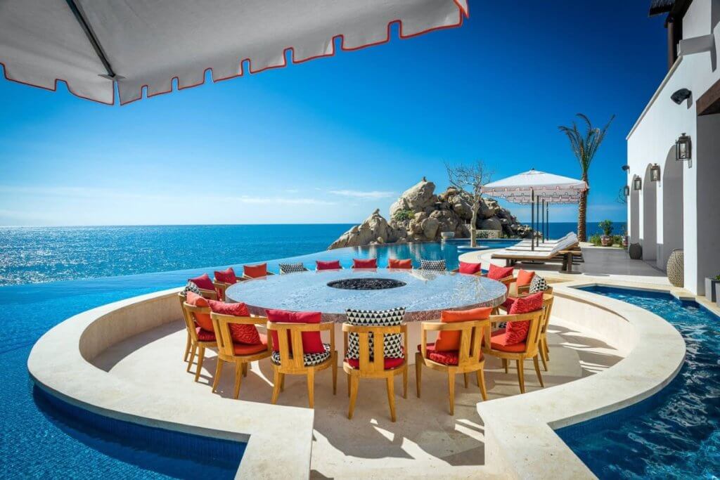La Datcha, Los Cabos luxury outdoor dining with infinity pool in Isle Blue Villa Collection.