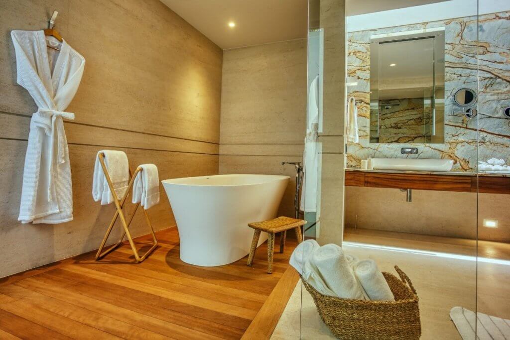 Luxury villa bathroom at Casa Del Oso with freestanding tub, marble vanity, and spa-inspired minimalist design.