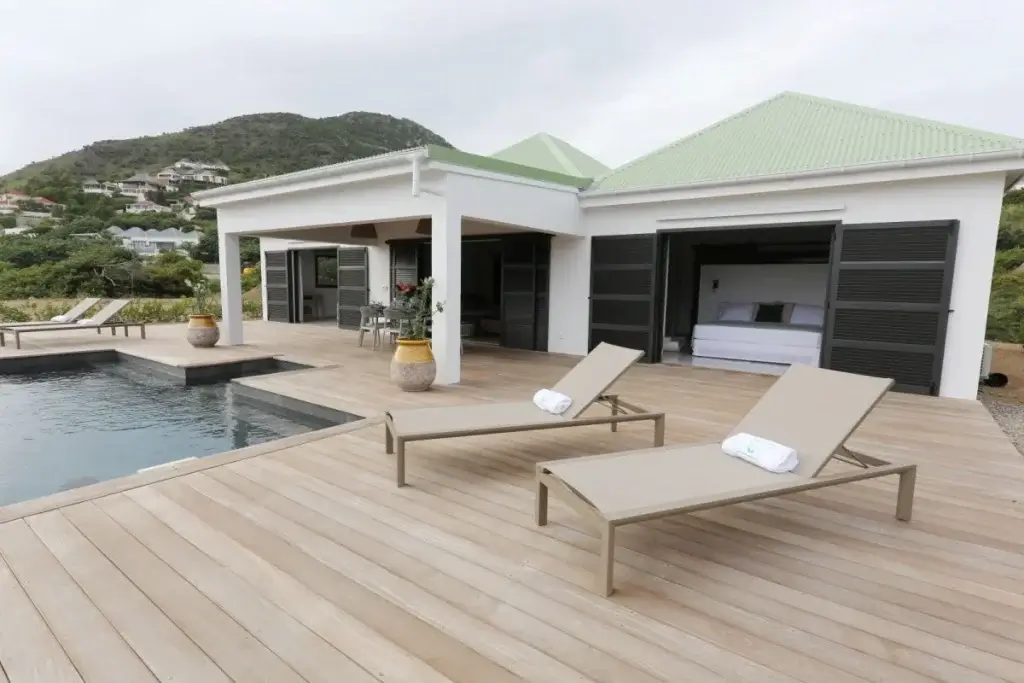 Private pool terrace at Luffy, St Barts, with sun loungers and direct bedroom access.