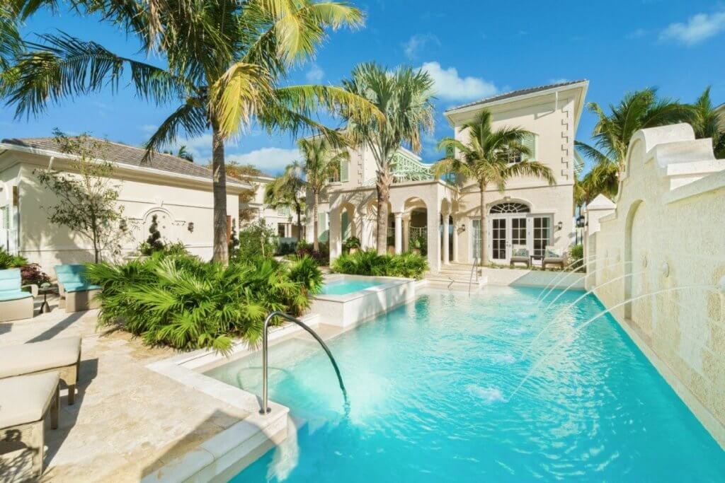 The Shore Club villa with sculpted pool, sun loungers, and palm shaded terraces, reflecting the best villas for luxury honeymoons.