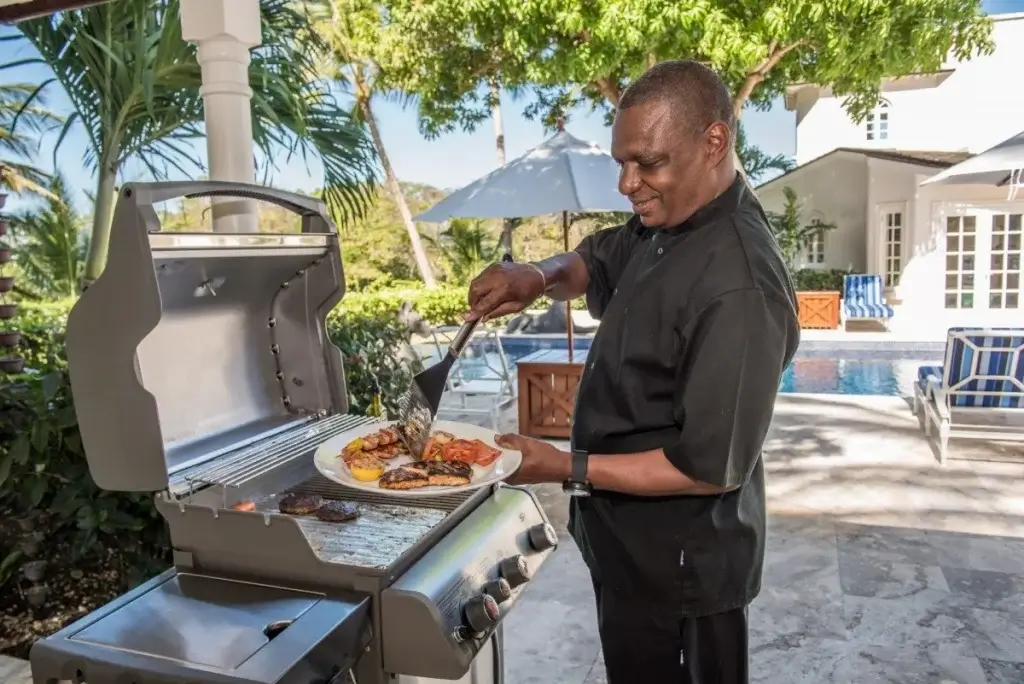 Private chef grilling poolside at Villa Casablanca, Barbados during what’s on in Barbados 2026 culinary season