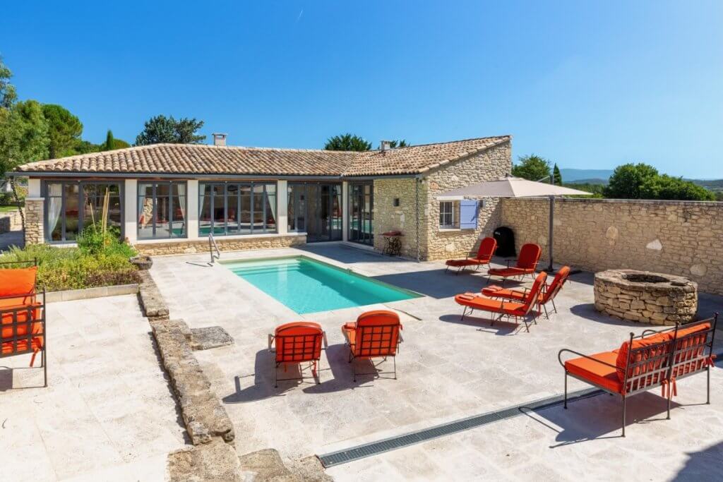 Stone terrace and pool at Paradis du Luberon, showing why it’s among the best villas in Provence for summer comfort.