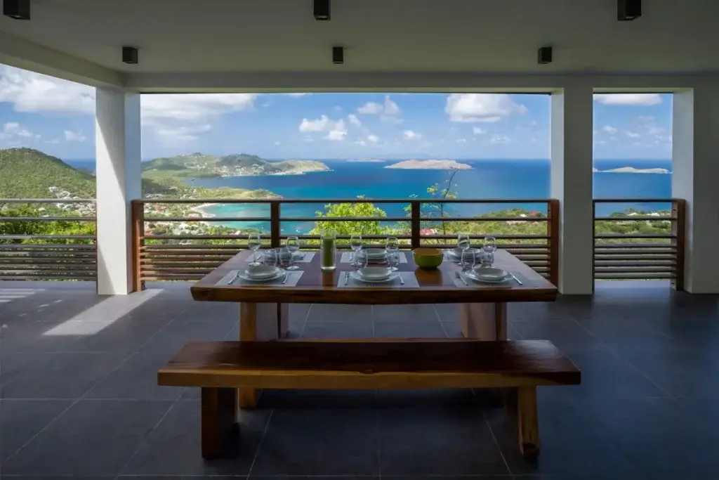 Oceanview dining terrace at Villa Clementine, St Barts showcasing curated St Barts experiences beyond the villa