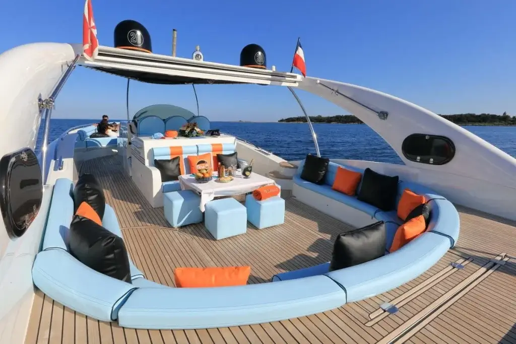 Luxury lounge deck aboard Yes Darling during a St Barts Private Boat Charter with ocean views and plush seating