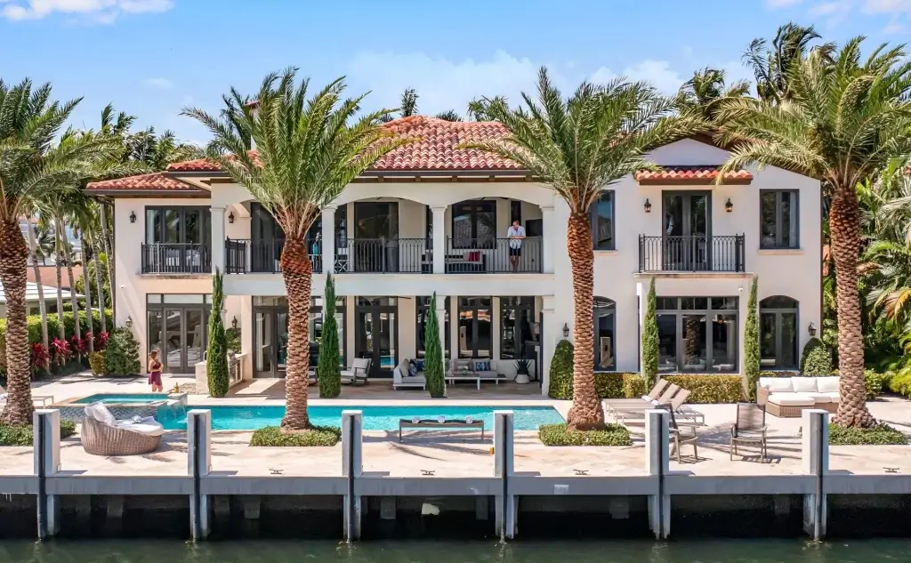 Memorial Day travel at Villa Mimosa Key, South Florida waterfront estate with private pool, dock, terraces, and palms