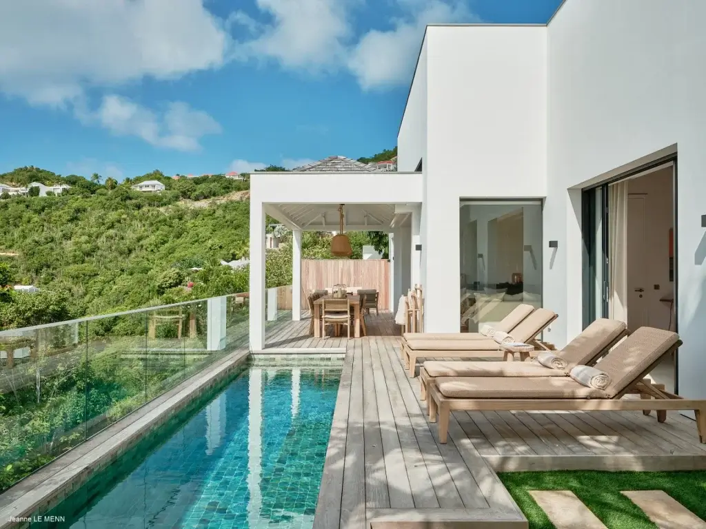 Villa Simona with private pool, loungers, terrace dining, and hillside views