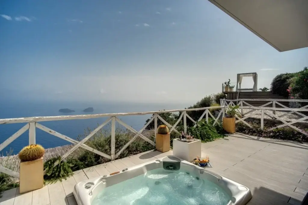 Italian summer escapes Villa Aldana Amalfi Coast terrace with private jacuzzi and panoramic sea views