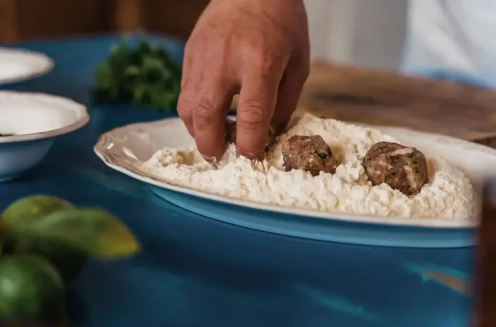 Rizes Cooking Workshop in Mykonos preparing local food with common Greek phrases
