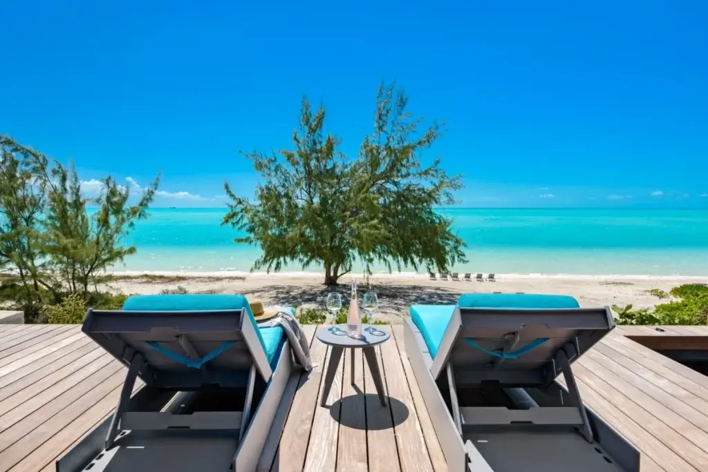 Oceanfront loungers at Villa Umi in Turks & Caicos, one of the Best Caribbean Islands for Couples