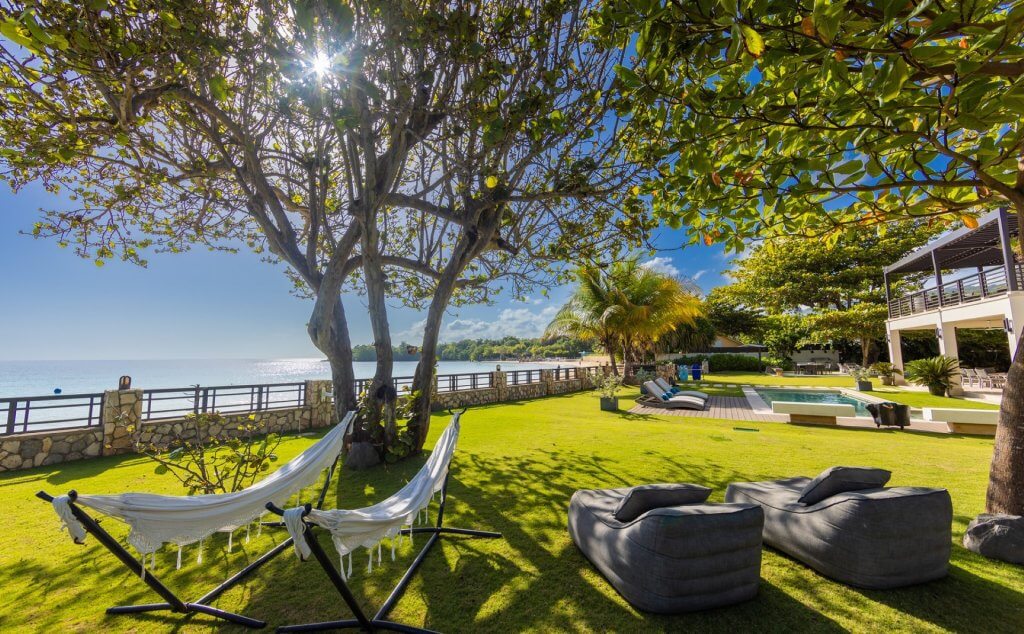 Sea Salt’s oceanfront lawn, hammocks and private pool, among Jamaica’s top luxury villas