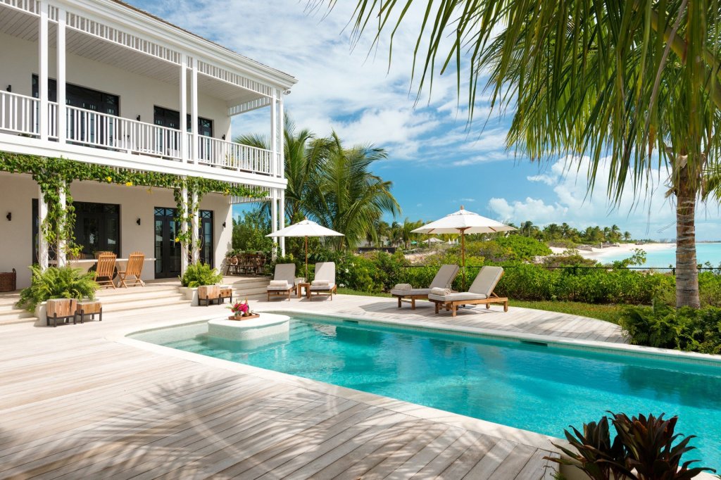 Saving Grace’s heated pool on Grace Bay, one of the best places to travel for Thanksgiving