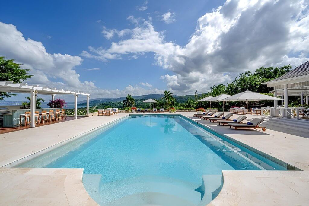 Longview Villa’s private pool and terrace overlooking Jamaica’s mountains and sea.